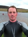 Cold on day one, me in the borrowed wetsuit!